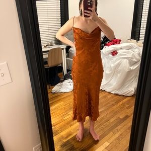 Size Small these three cowl neck Rust red silk dress. open back